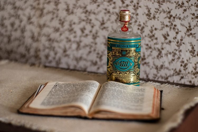 No 4711 Cologne Review: A True Classic No 4711 Cologne near a book
