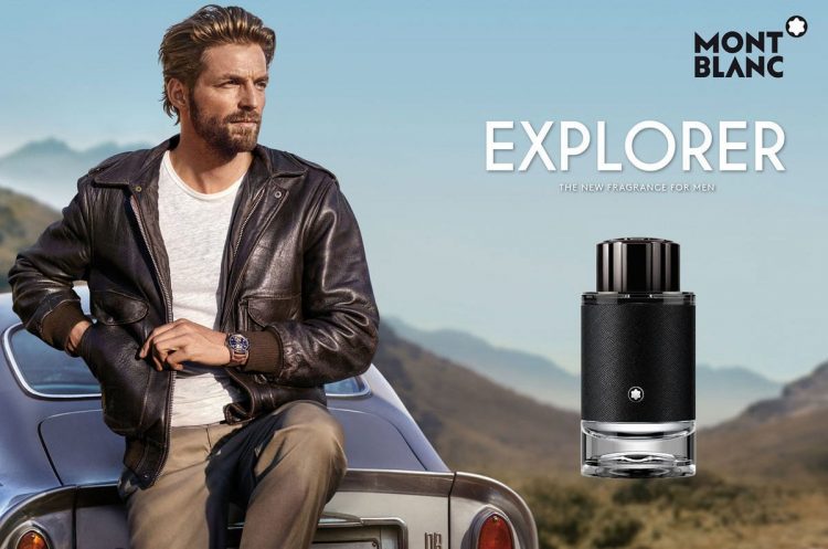 Montblanc Explorer EDP Review: Is It Worth It? Montblanc Explorer EDP next to a men staying behind a car, represents the idea of the perfume