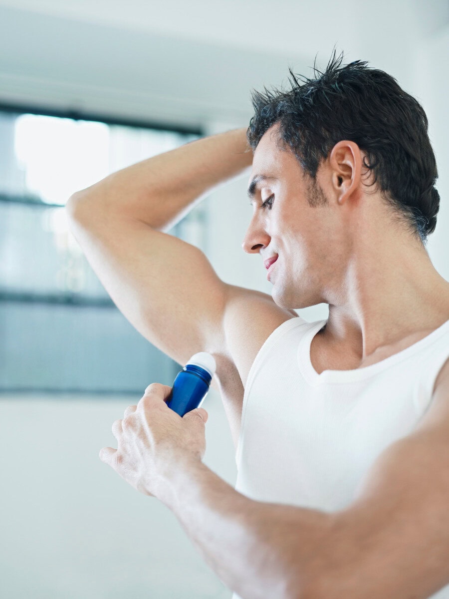 Pit Squad: Best Smelling Men’s Deodorants man using deodorant