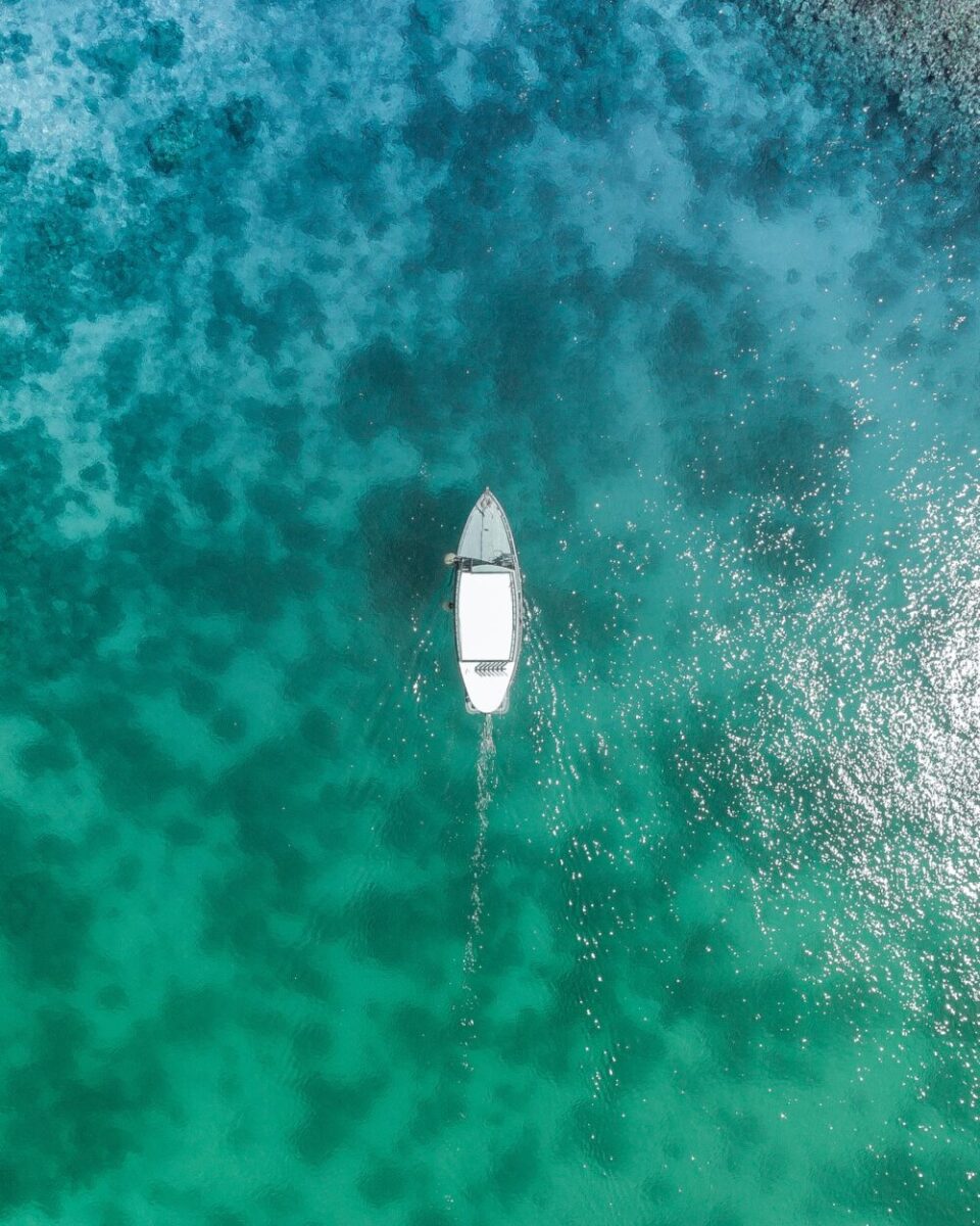 Nautica Voyage Cologne Reviewed: Bargain or Waste of Money? Boat in Ocean
