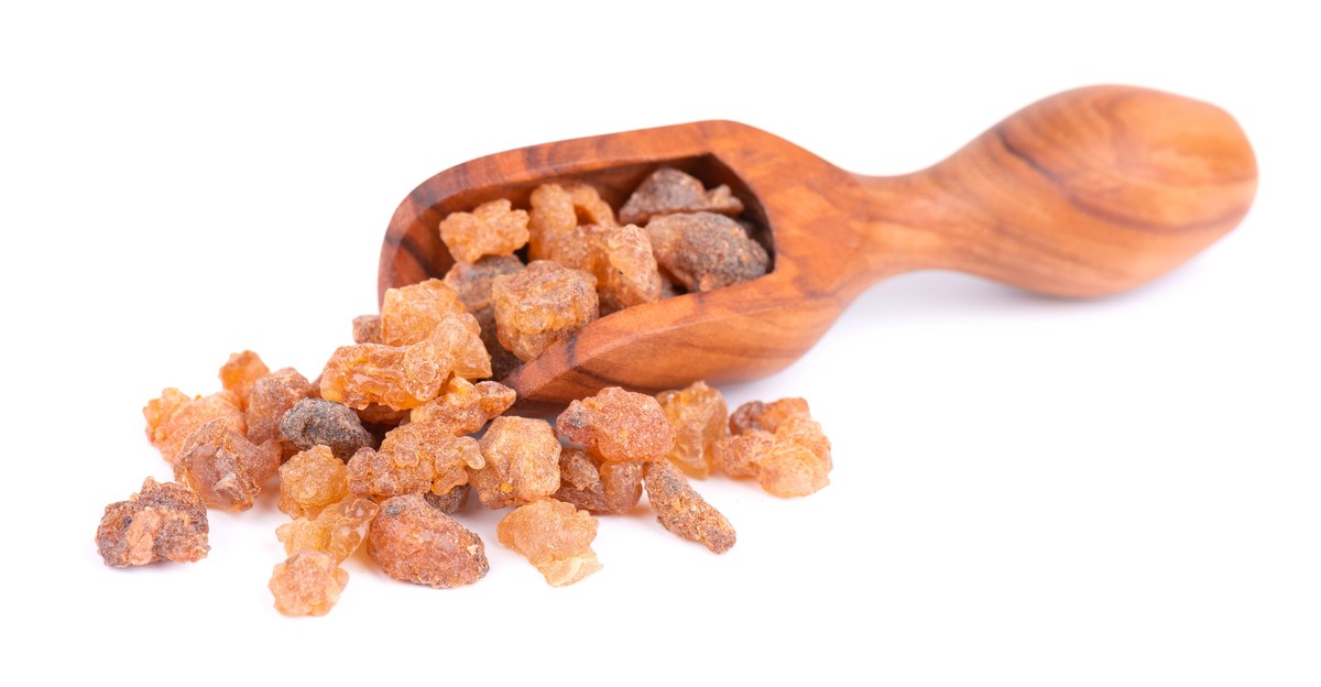 What Does Opoponax Smell Like? Reddish-brown opoponax sweet myrrh resin in a wooden scoop