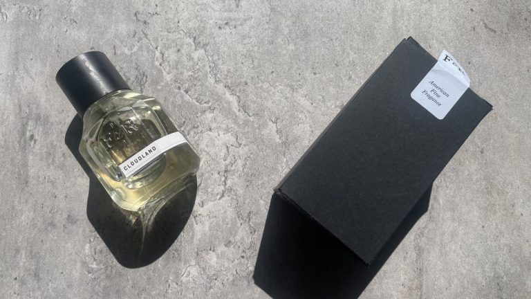 Fulton & Roark Cloudland 50ml bottle beside its black F&R box on sunlit concrete