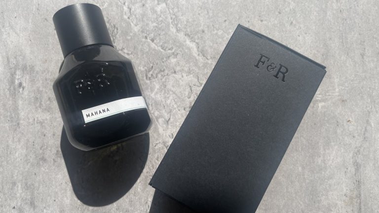 Fulton & Roark Mahana 50ml bottle beside its debossed F&R box on sunlit concrete
