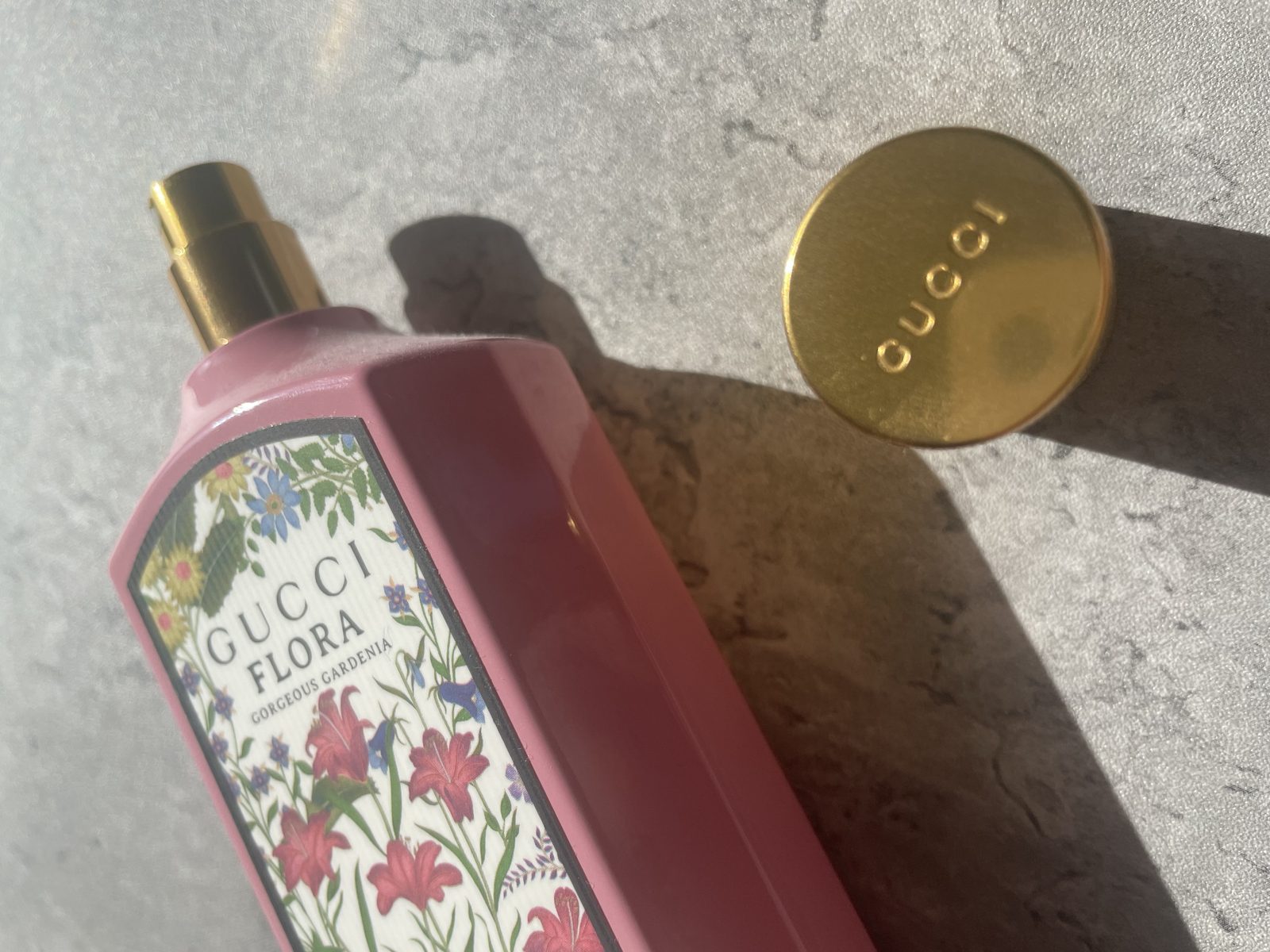 Gucci Flora Gorgeous Gardenia Review: The Flower That Isn't There Extreme close-up of the chinoiserie floral print on the Gucci Flora Gorgeous Gardenia bottle