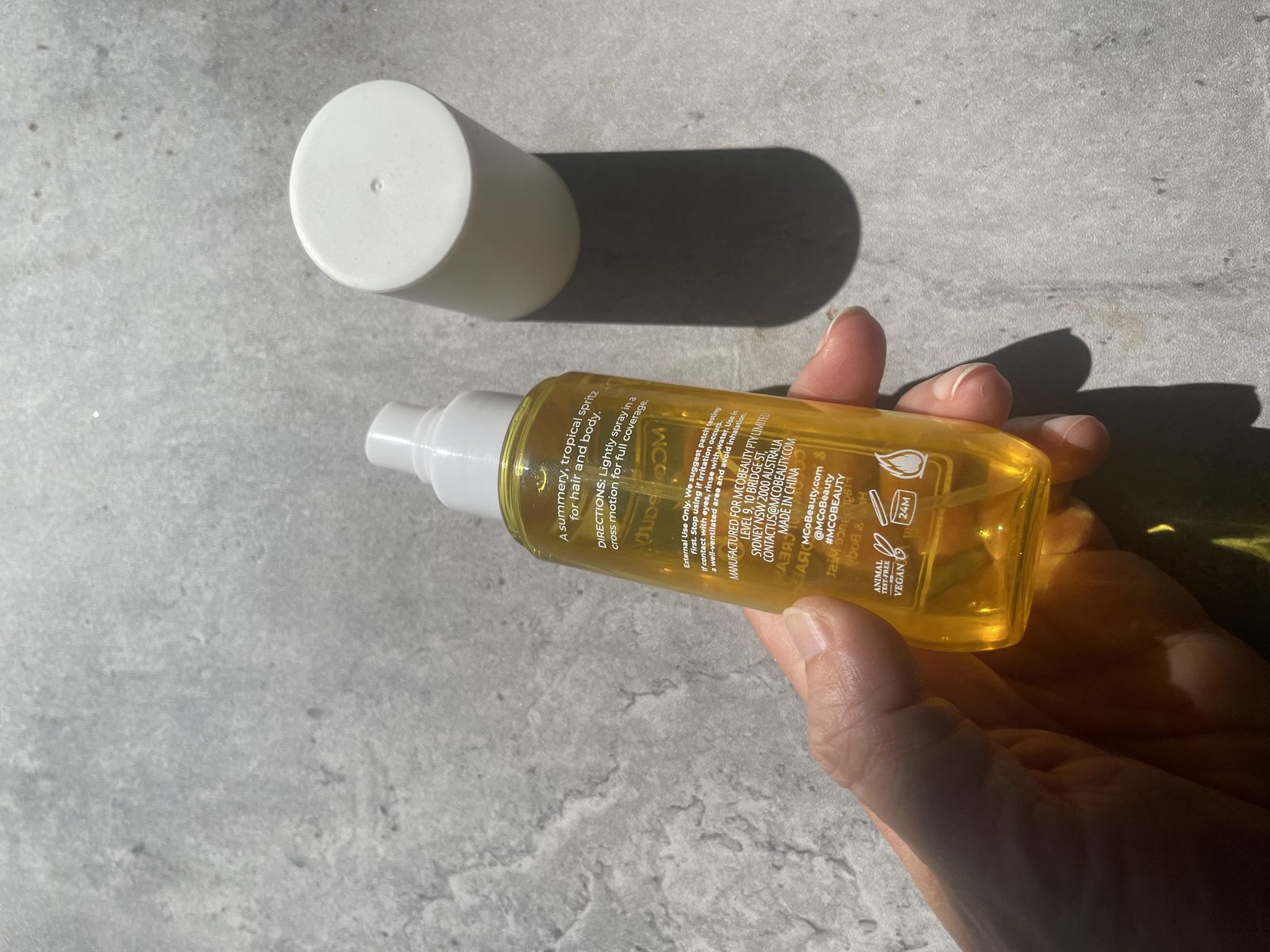 MCoBeauty No.6 Coconut Cream Review: The Batch Code Its Sibling Hides Back of the MCoBeauty No.6 bottle showing directions, MCoBeauty Pty Limited Sydney, made in China, vegan and animal test-free