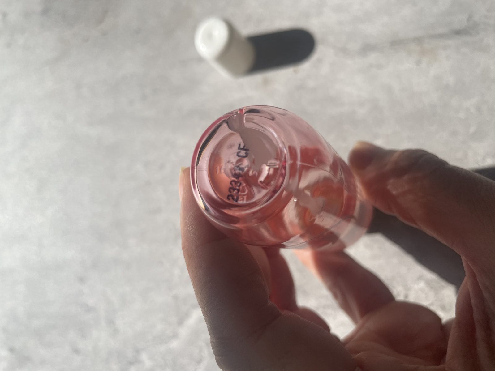 Sol de Janeiro Cheirosa 68 Review: The One That Isn't Pistachio Base of the Sol de Janeiro Cheirosa 68 bottle showing the inkjet batch code 2334 CF