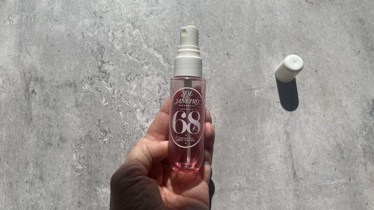 Sol de Janeiro Cheirosa 68 perfume mist on sunlit concrete
